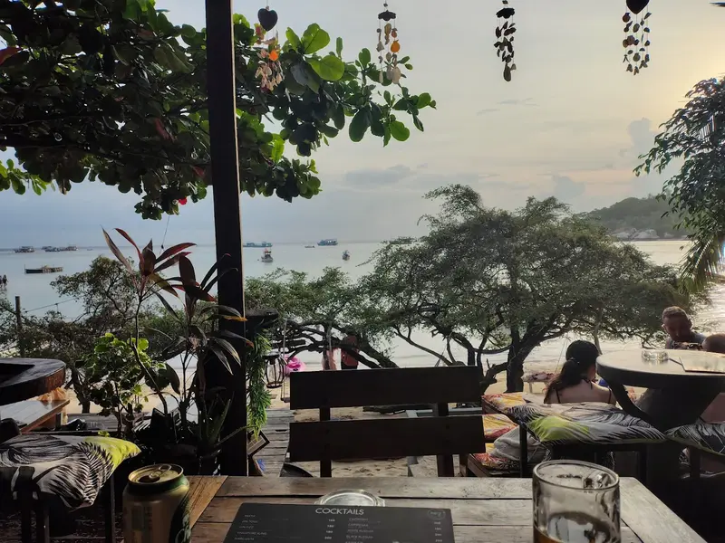 Bar terrace at dusk with sea view
